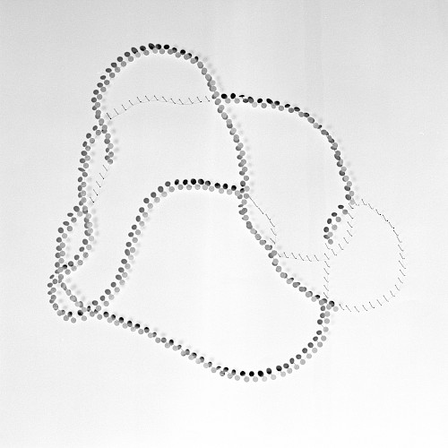 <i>Invariant Variation #32</i>, 2013<br />
<em>Analoger SW-Print</em><br />
10 x 10 cm